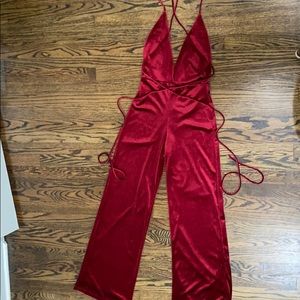 Red velvet jumpsuit. Worn once